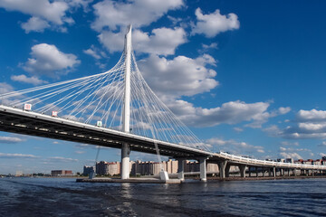 New highway road with cable-stayed bridge with blue sky in Saint Petersburg, Russia. June 14, 2018.