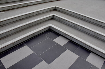 Modern architecture detail. Grunge texture of outdoor staircase. Step of rock stair with vintage style. 