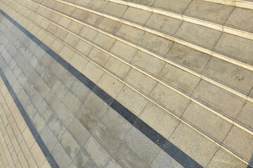 Modern architecture detail. Grunge texture of outdoor staircase. Step of rock stair with vintage style. 