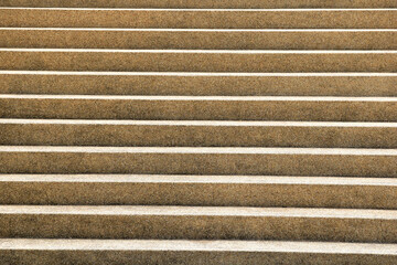 Modern architecture detail. Grunge texture of outdoor staircase. Step of rock stair with vintage style. 