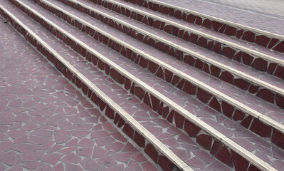 Modern architecture detail. Grunge texture of outdoor staircase. Step of rock stair with vintage style. 