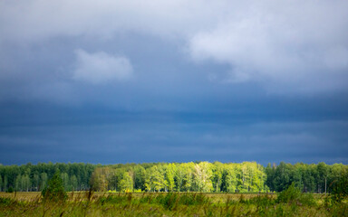 Fototapeta na wymiar bright blue clouds before the rain