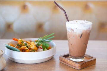 Rice with fried shrimp and garlic served with iced Mocha coffee
