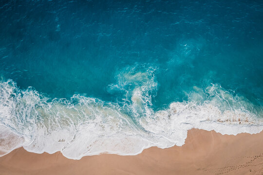Wild beach, top view, waves