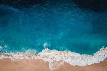 Wild beach, top view, waves