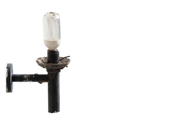 Energy saving lamp on wall lamp old and dirty condition isolated on white background , Ideal for use in the design
