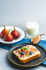 A western breakfast with figs and bread and milk