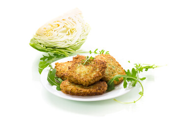vegetable vegetarian fried cabbage pancakes in a plate