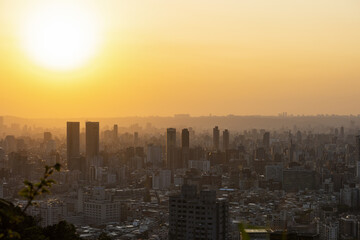 View from above, stunning sunset over the Taipei City skyline. Panoramic view from the Mount Elephant in Taipei, Taiwan.