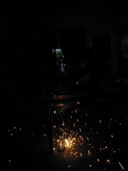 Sparking from welding work doing by man