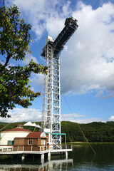 Bungy jump on blue sky and lake