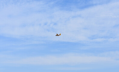 Rescue plane flying with blue sky
