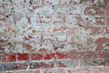 Old Brick wall with peeling paint
