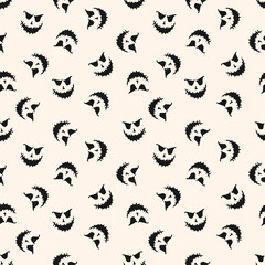 Fototapeta premium Halloween vector seamless pattern. Black and white abstract texture with scary pumpkin face, Jack o lantern silhouette. Simple doodle style monochrome background. Creepy design for print, wrap, decor