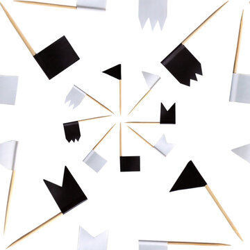 Seamless pattern with black and white flags on wooden toothpicks isolated on a white background. 