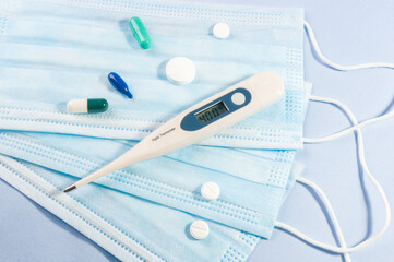 Background concept for news about the novel coronavirus COVID-19 pandemic, antiviral medical mask...