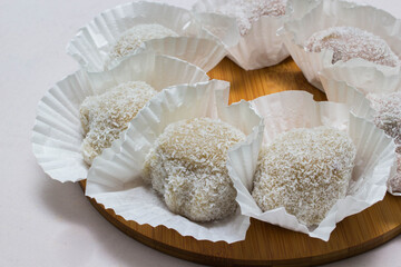 The colorful mochi dessert ice cream on wood plate ,Close Up photo with selective focus.