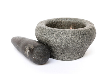 Stone mortar and pestle isolated on white background.