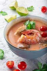 Tom Yam soup with shrimp. Thai soup with shrimp, coconut milk and pepper. Tom Kha Kai traditional Thai shrimp soup