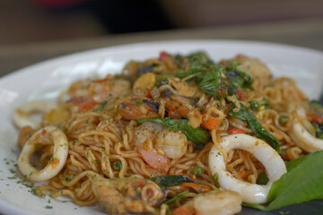 Stir Fried Noodles with Basil Leaves, Shrimp and Squid