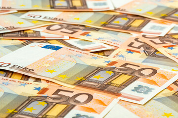 Obraz na płótnie Canvas Pile of 50 euro banknotes, european currency