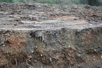Surface covered with mud after stream overflow in the outskirts of Athens in Attica, Greece.