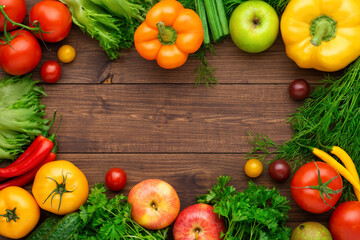 Healthy eating ingredients: fresh vegetables, fruits and superfood. Wooden background
