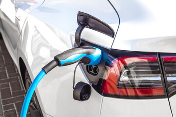 Obraz premium Detail of electric car at station in Bergen, Netherlands