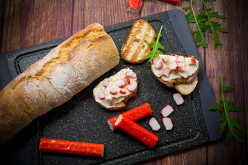 cheese sandwich and crab sticks on top