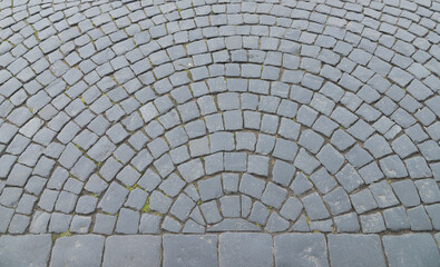 Old cobblestone pavement top view