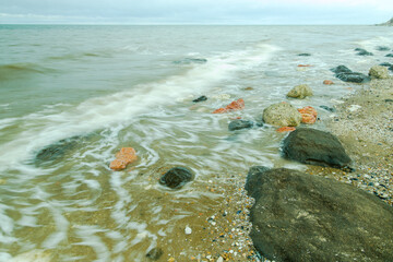 Swirles on the incoming tide at Hunstanton.