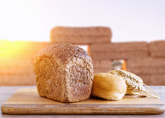 decoration of white flour on brown toast bread and sunset