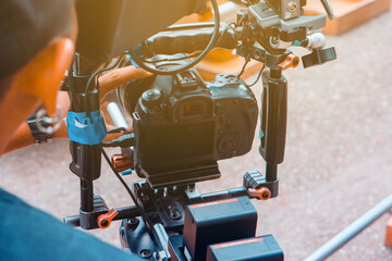 Film industry. Filming with professional camera background