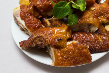 Roast Chicken Chinese Style ,selective focus , blur background , on white background