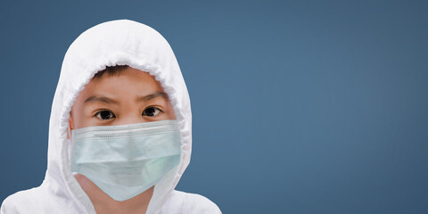 Asian boy wearing medical protection mask for the coronavirus-19 outbreak pandemic prevention.