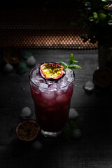 Cocktail with passion fruit and mint 