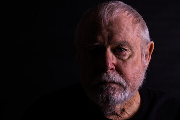 Profile Of Senior Man With Scraggly Beard