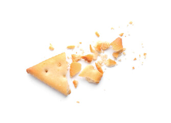 Broken delicious crispy cracker isolated on white, top view