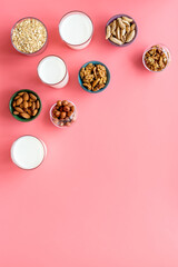 Set of non-dairy milk - almond hazelnut walnut oat. Top view, copy space