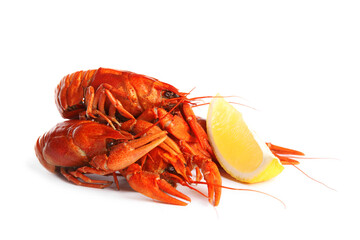 Delicious red boiled crayfishes with lemon isolated on white