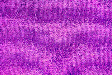 Cleaning microfiber pattern. Purple polyester microfibre texture. Synthetic fiber material Cleaning cloth for dust or kitchen top view closeup