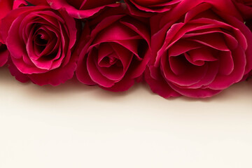 red roses and white card with a place for a congratulatory text on a black background