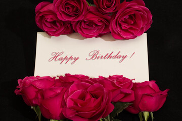 Roses and card Happy birthday - holiday background