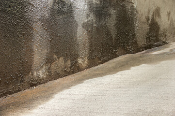 Entrance to a parking lot with entrance of outside water caused by heavy rains