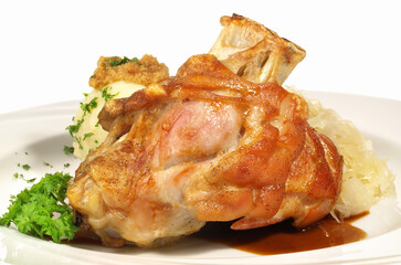 Grilled crusty Pork Knuckle with Sauerkraut - Isolated on white Background