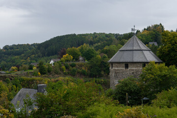 Fototapeta premium View to round tower of the castle in the german village called Monschau