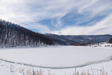 Winter, snow scene, frozen lake. Winter landscape