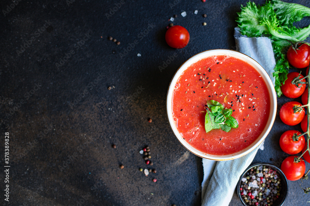 Wall mural tomato soup gazpacho in a plate on the table tasty serving size portion top view copy space for text keto or paleo diet