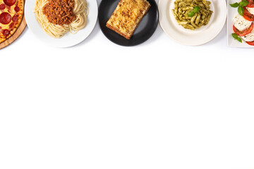 Assortment of Italian pasta dishes isolated on white background .Top view. Copy space