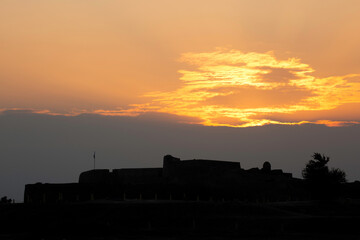 Silhouette of Ancient Bahrain Fort during sunset, Bahrain